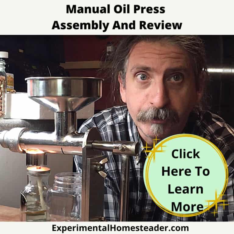 Manual oil press machine for small-scale home oil extraction and homemade oil production.