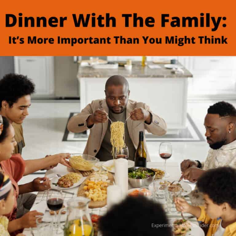 Dinner with family enjoying homemade pasta and fresh salad at a cozy home gathering.
