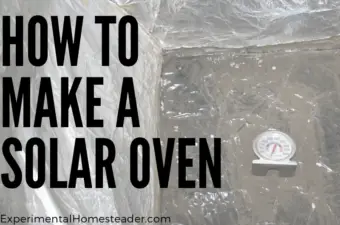 The inside of the homemade solar oven with a oven thermometer in it.