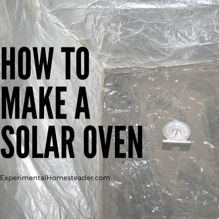 The inside of the homemade solar oven with a oven thermometer in it.