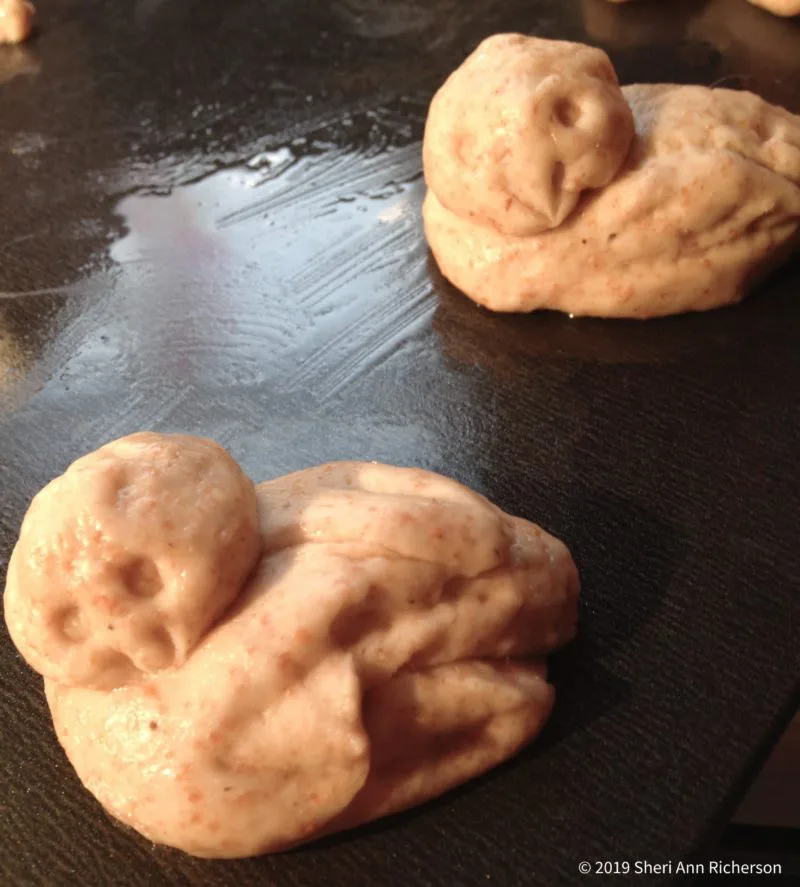 Shaped bird bread dough.