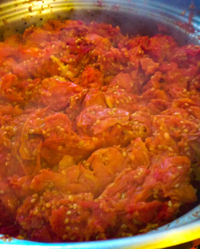 The tomato pulp that is left in the top of the steamer juicer.