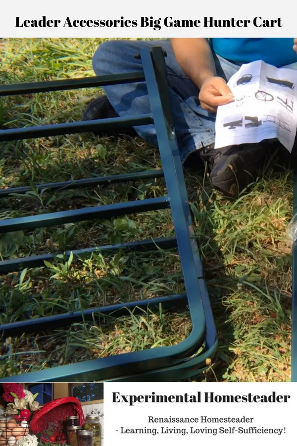 Pieces of the game hunter cart laying on the ground and Jeffrey holding the assembly instructions.