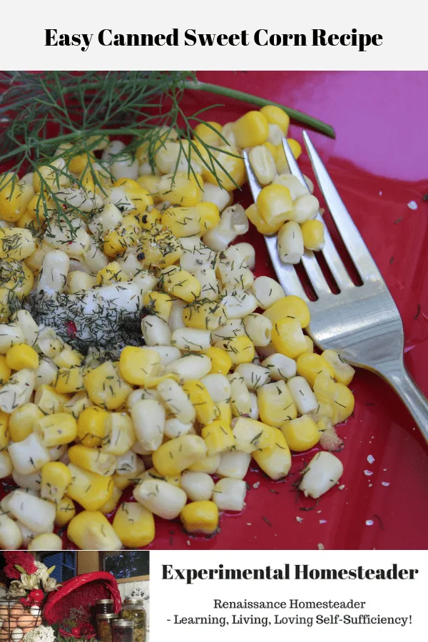 Freshlike Selects Gold & White Corn on a red plate with a sprig of dill weed off to the side and fresh dill weed plus butter on the corn.