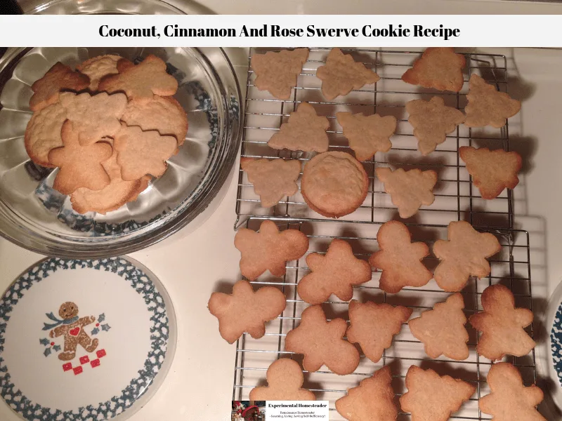 The baked Swerve cookie recipe cooking on a wire rack with some of the cooled cookies resting on a cake plate waiting to be decorated.