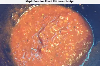 The maple bourbon peach rib sauce recipe in a cast iron melting pot.