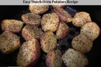 Seasoned potatoes cooking in a cast iron Dutch oven.