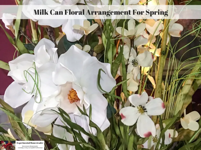 White Magnolia and white Dogwood silk flowers made into a floral arrangement.