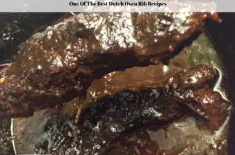 Ready to eat ribs being taken out of a cast iron dutch oven.