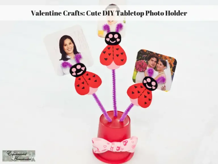 The completed tabletop photo holder with photos in it.