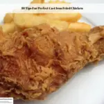 A double fried chicken leg and French fries on a white plate.