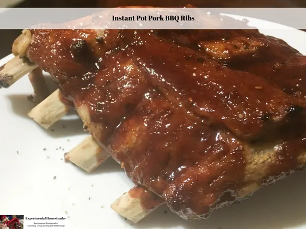BBQ pork ribs on a plate getting ready to be served.