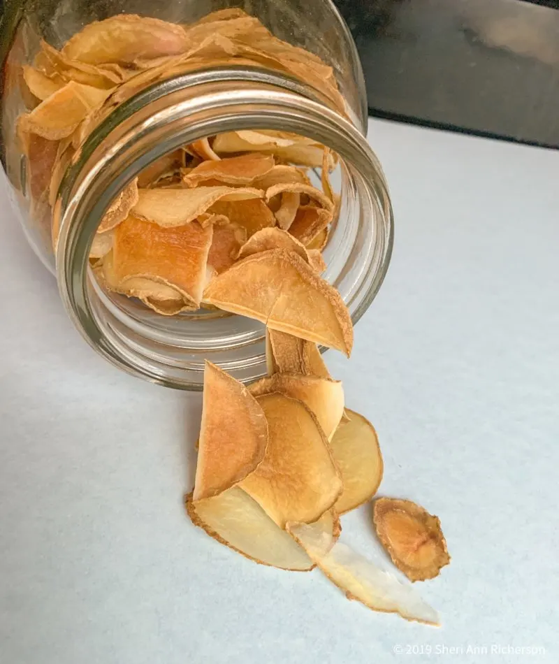 Dehydrated potatoes stored in a glass jar.