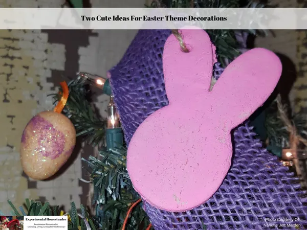 A primitive Easter tree decorated with handmade salt dough ornaments. In this photo you see a purple burlap streamer, a pink salt dough bunny rabbit head and a fake Easter egg.