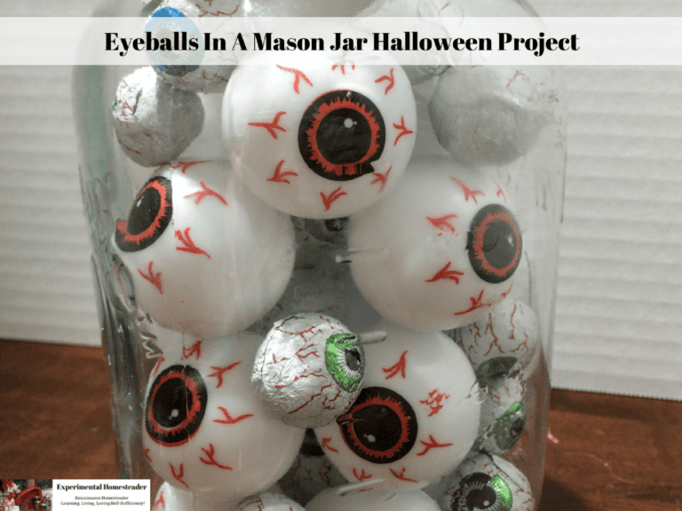 Eyeball Halloween decorations in a mason jar, spooky eye craft for fall decor, DIY Halloween project.