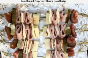 Ham kabobs on a plate.