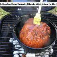 Maple Bourbon Glazed Precooked Ham In A Dutch Oven On The Grill - Experimental Homesteader
