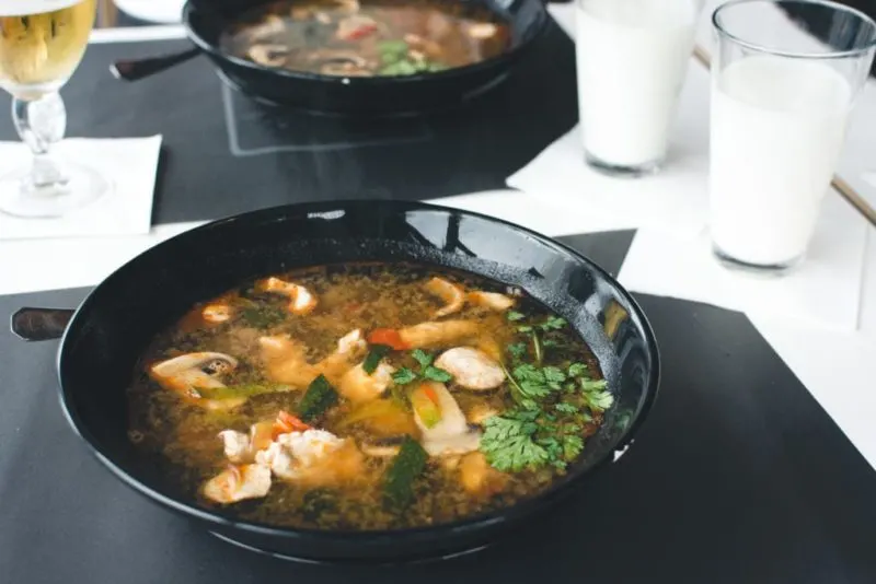 Thai soup in a skillet.