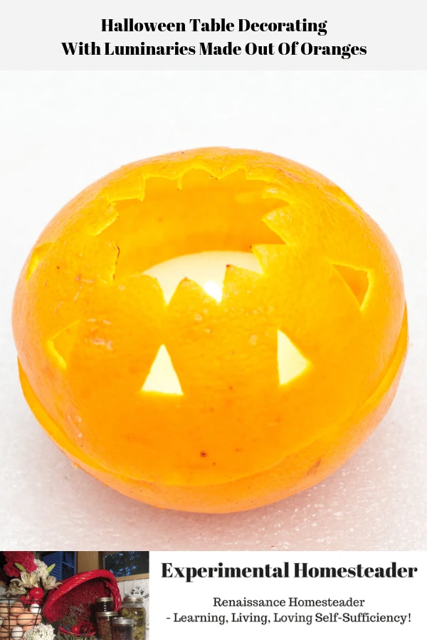 An orange peel turned into a luminary with a candle inside of it.