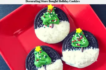 Oreo cookies decorated with a Christmas tree and candy snow on a red plate.