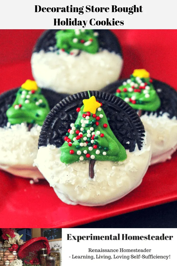 Oreo cookies decorated with a Christmas tree and candy snow on a red plate.