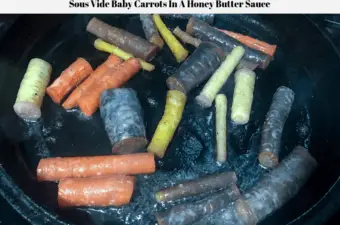The Sous Vide Baby Carrots being browned on a cast iron griddle.