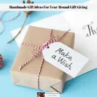 A hand wrapped gift, a spool of string and a thank you card.