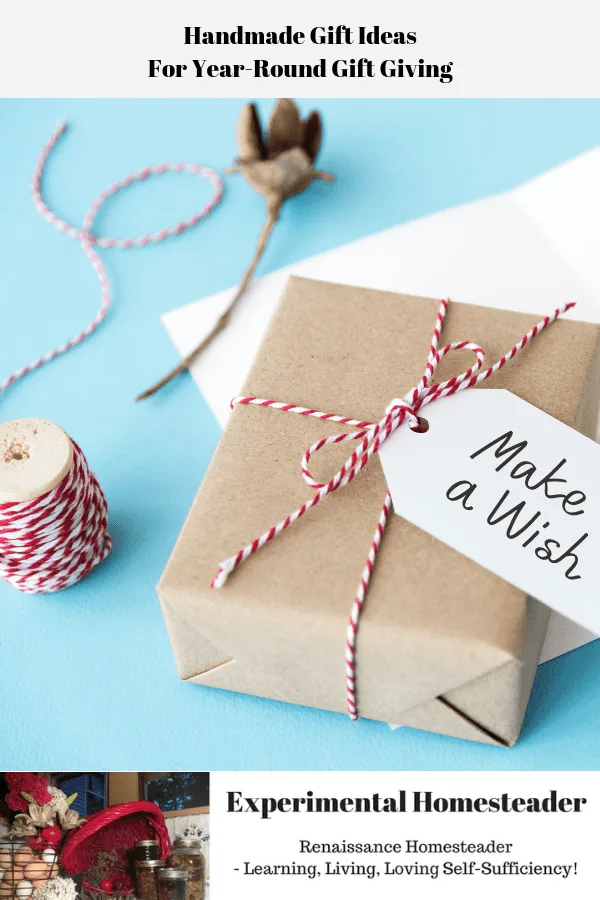 A hand wrapped gift and a spool of string.