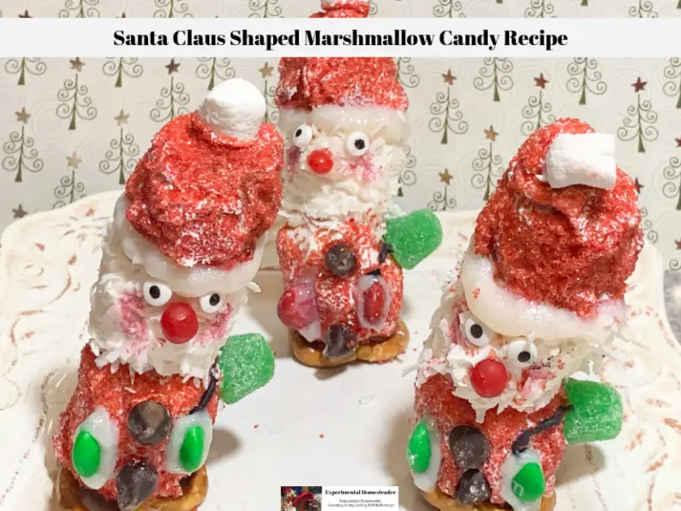 Three Santa Claus Shaped Marshmallow Candies standing on a plate ready to eat.