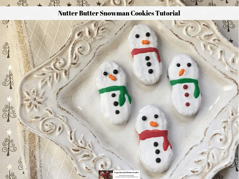 Decorated Nutter Butter Snowman Cookies on a plate.