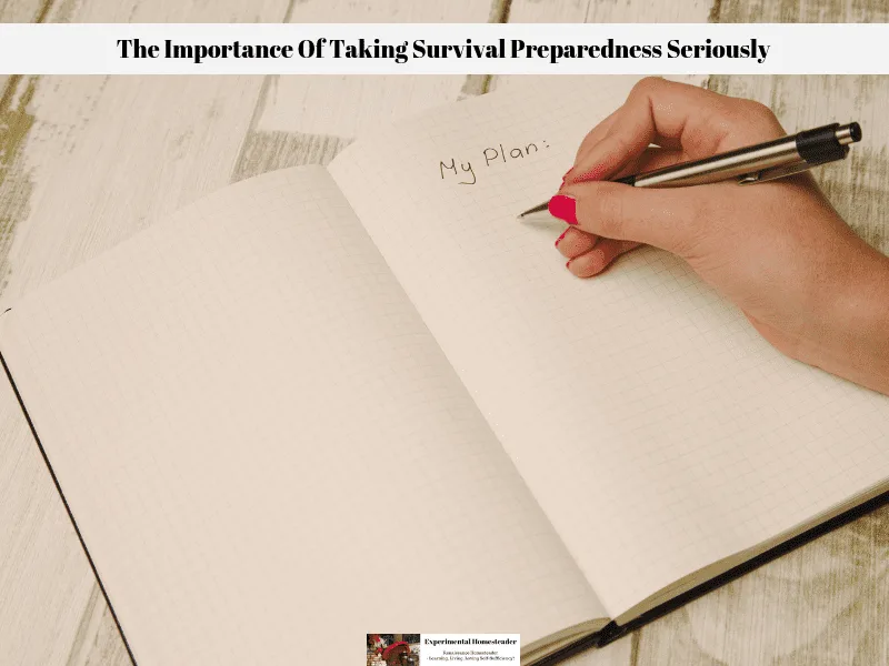 A lady writing a survival preparedness plan in a notebook.