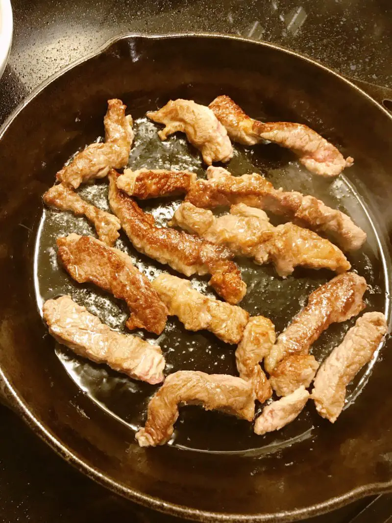 The browned beef strips.