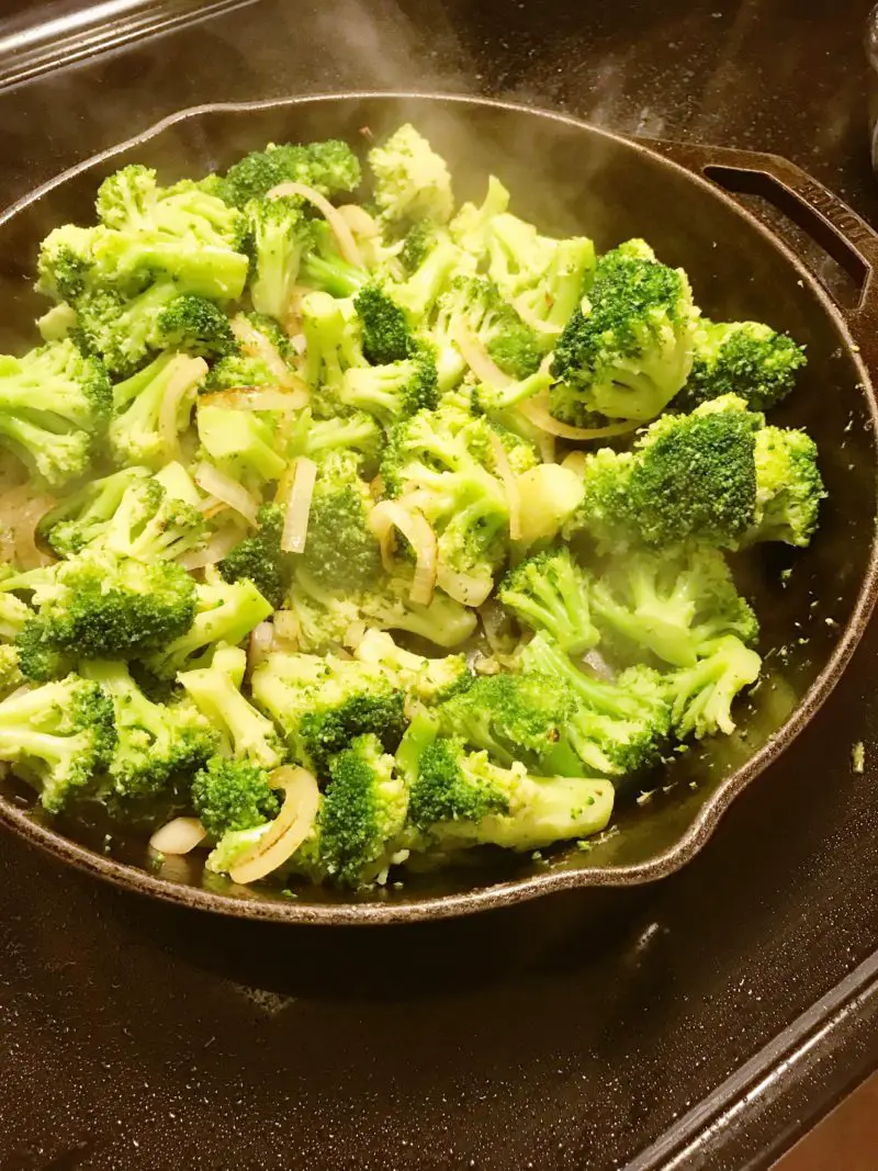 The broccoli in the cast iron skillet.