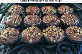 Gluten-free brownies baked inside a wood burning cook stove sitting and cooling.