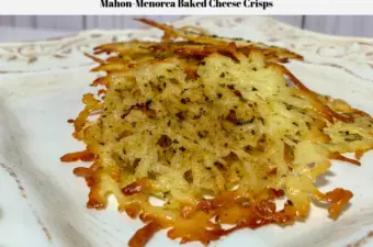 The baked cheese crisps sitting on a plate ready to be served.