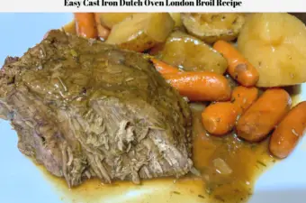 The London Broil, potatoes and carrots on a plate ready to be eaten.