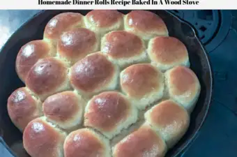 The ready to eat homemade dinner rolls recipe resting in the cast iron skillet on top of the wood burning cook stove.