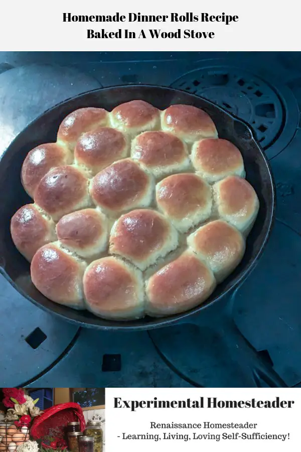 The ready to eat homemade dinner rolls recipe resting in the cast iron skillet on top of the wood burning cook stove.