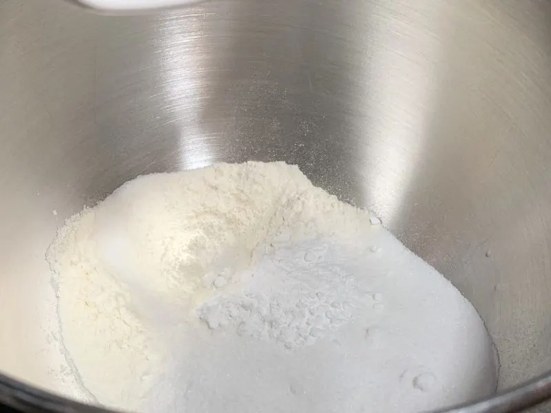 The sugar, salt, flour and baking soda in a bowl.