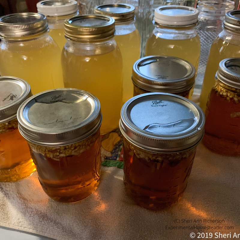 Canning jars filled with food.