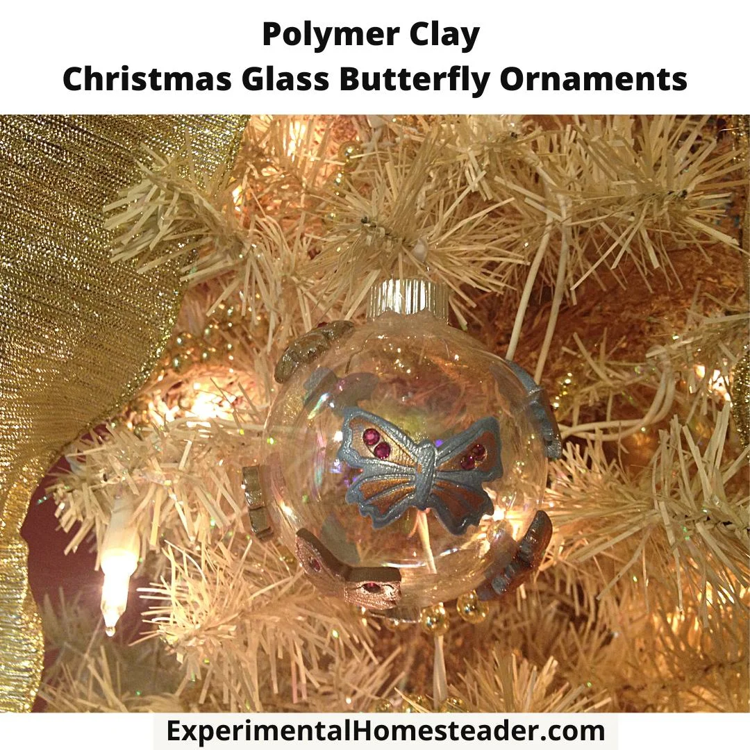 Polymer Clay Christmas Glass Butterfly Ornament hanging on a white Christmas tree.