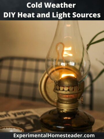 Antique kerosene lamp glowing on a rustic table, symbolizing cold weather DIY heat and light sources.
