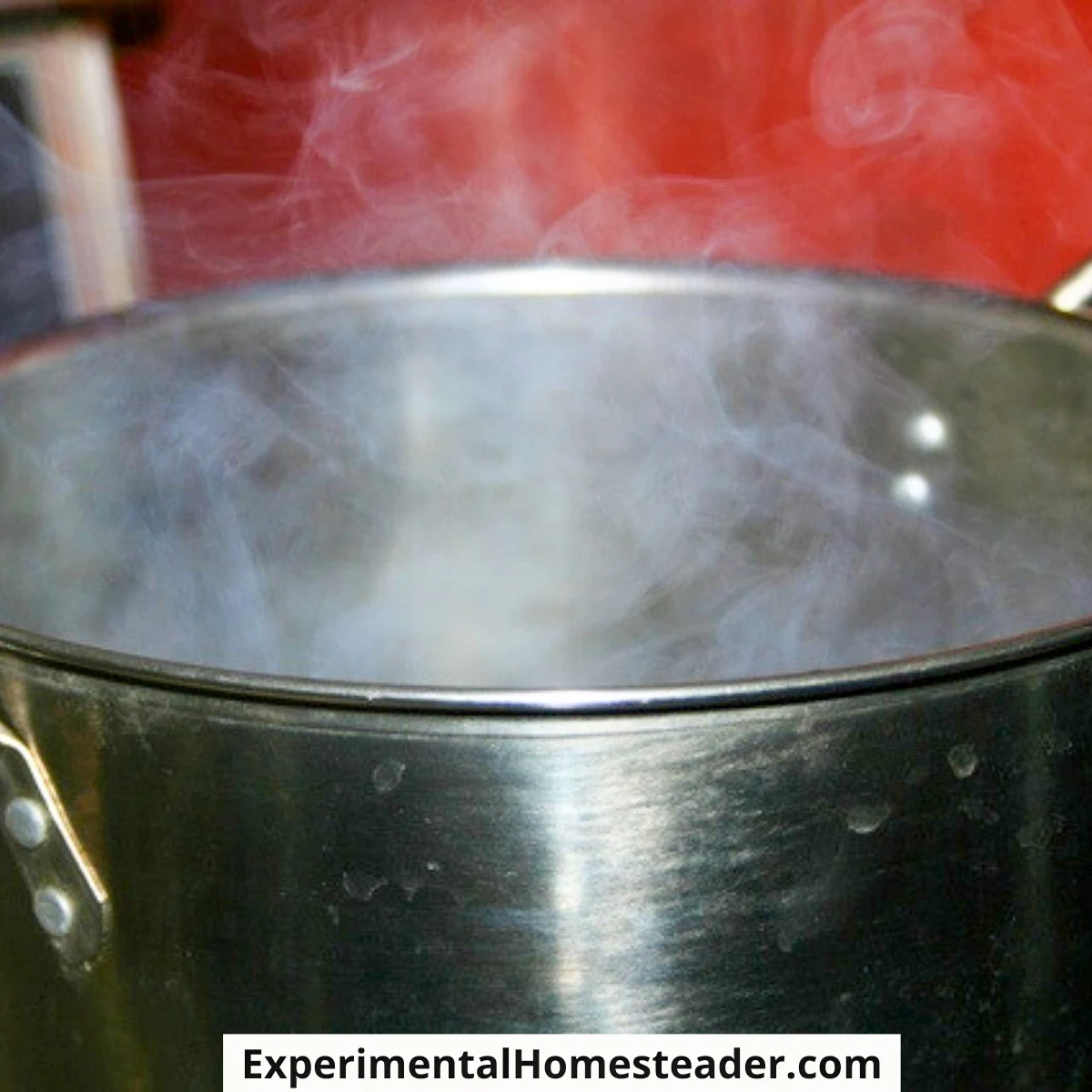 Steam rising from the bottom pan of a double boiler used to melt cocoa butter.